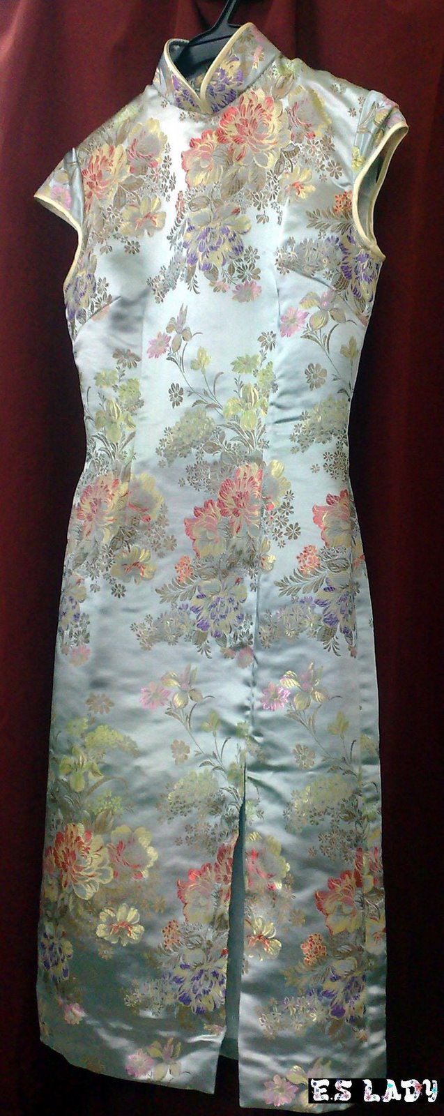 Custom pale blue floral brocade cheongsam with mandarin collar, made in the atelier