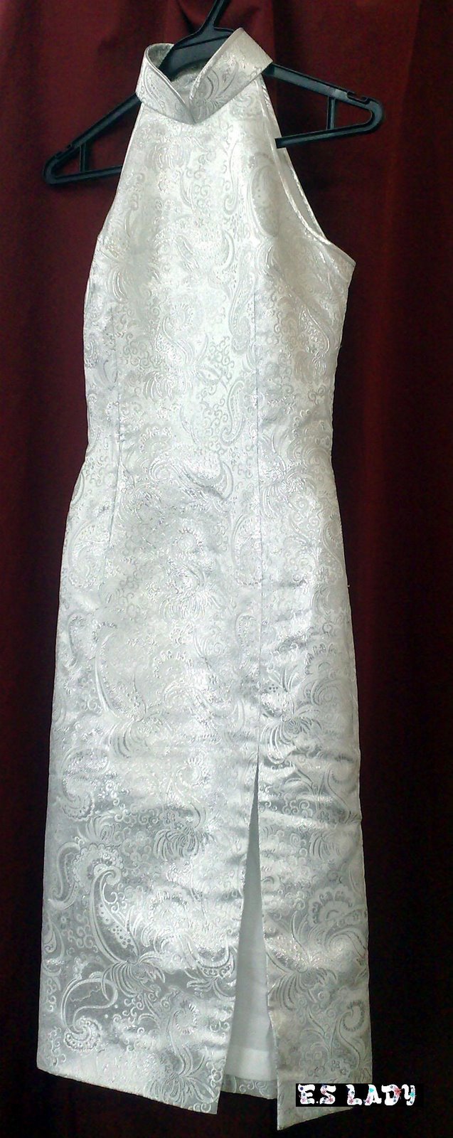 White brocade halter-neck dress made in the atelier